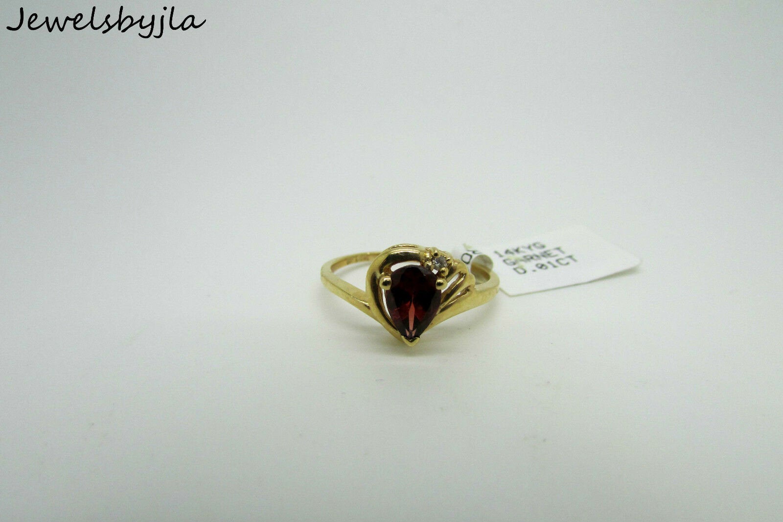 14K Yellow Gold Ladies Pretty Pear Shape Garnet Ring With Diamonds Size 6.5