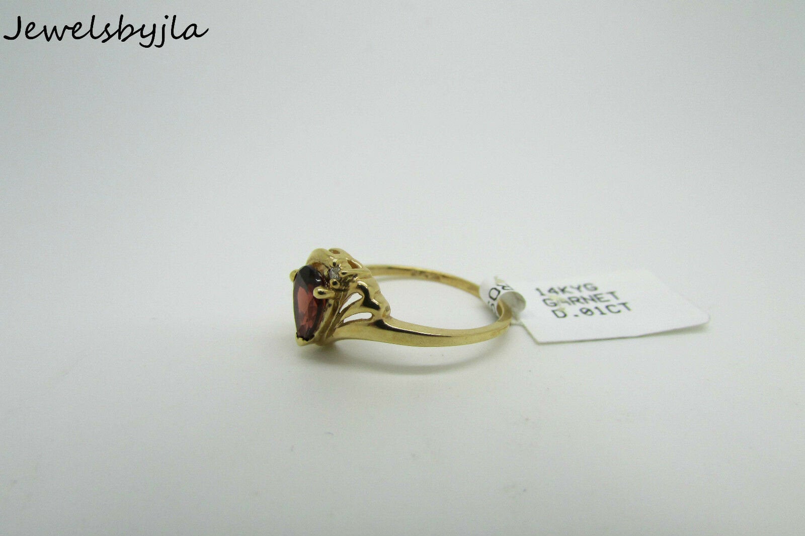 14K Yellow Gold Ladies Pretty Pear Shape Garnet Ring With Diamonds Size 6.5