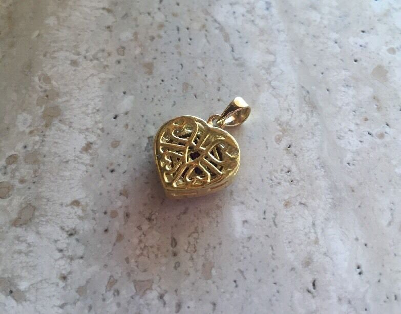 14K Pretty Yellow Gold Heart Pendant With Ruby Stones And Diamonds 0.95 Cts