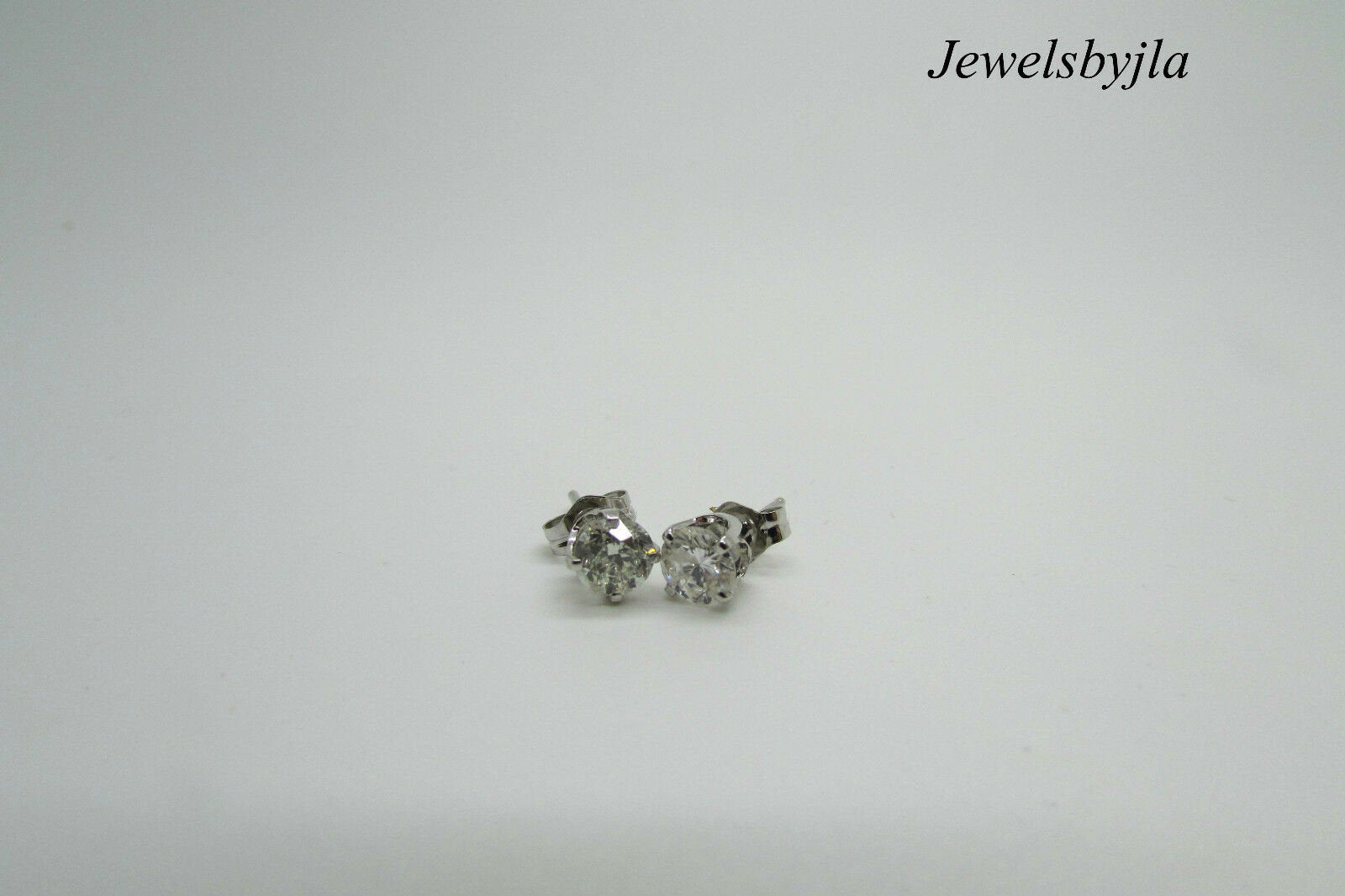 14K Pretty White Gold Clean Round Diamond Stud Earrings .82 Points G Si2