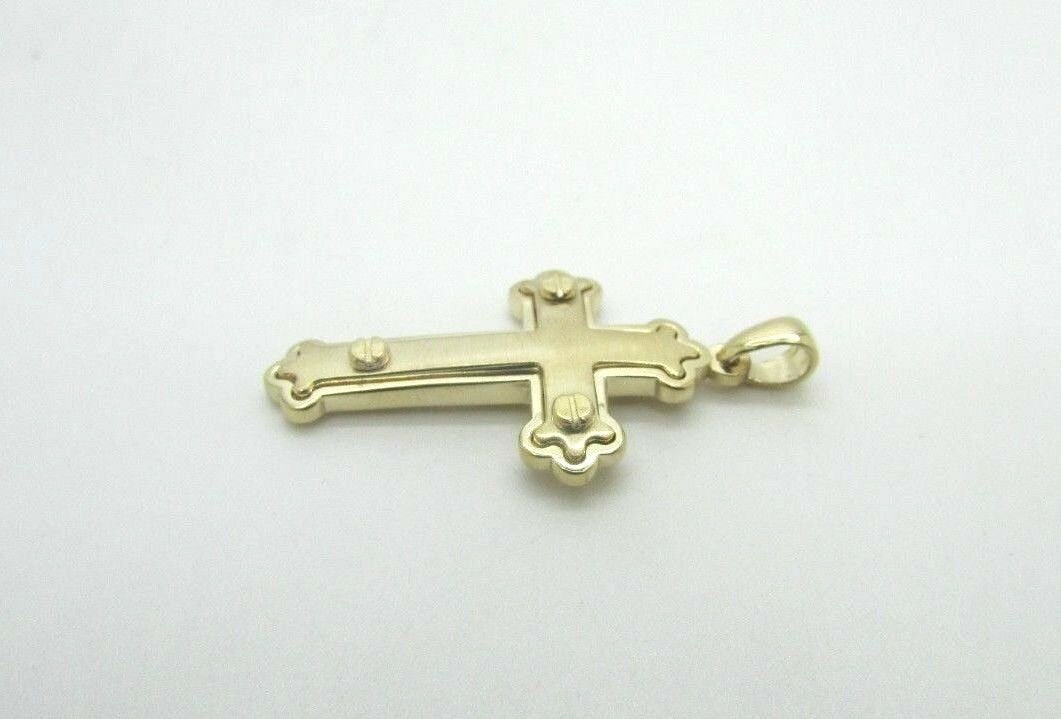 14K Pretty Yellow Gold Cross With White Gold Screw Circles On The Corners