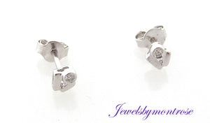 14K White Gold &quot;V&quot; Stud Earrings Holding 0.05 Cts Diamonds Weight 1.2 Grams.