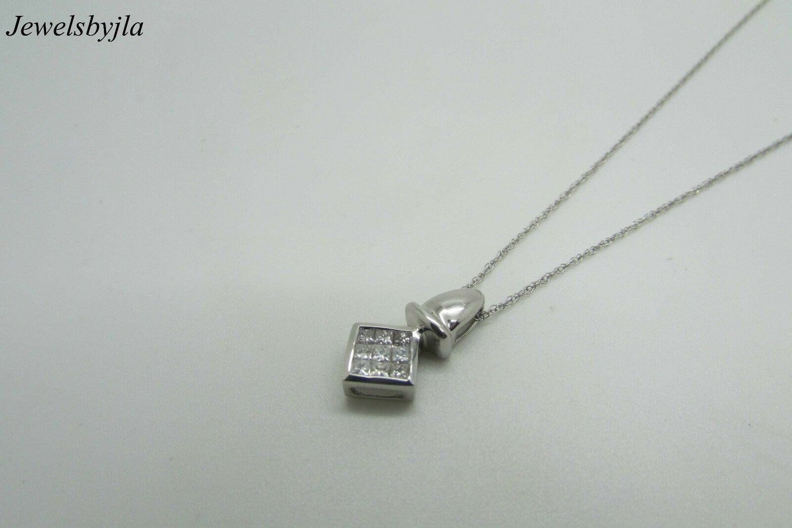 14K Pretty White Gold Square Pendant With 9 Princess Cut Diamonds 0.26 Cts