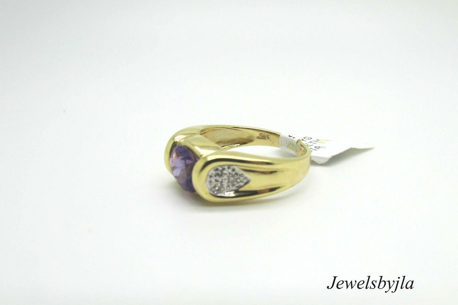 14K Pretty Yellow Gold Ladies Ring With Oval Shape Amethyst Stone And Diamonds