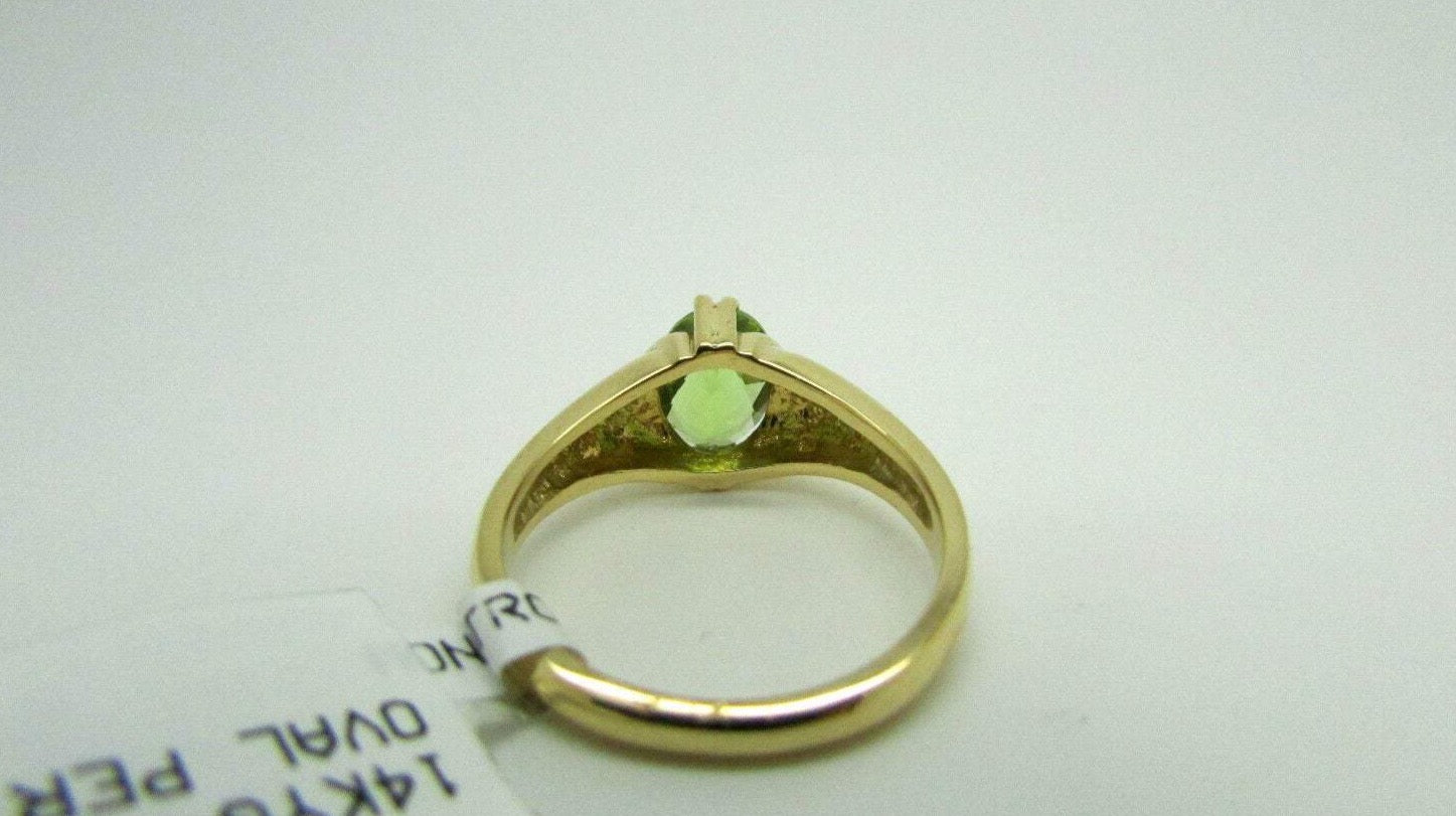 14K Yellow Gold Ladies Pretty Oval Shaped Peridot Ring 3.9 Grams Size 7