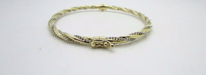 14K Pretty Two Tone Gold Bracelet With Twisted Diamond Cut Chain Wrapped Around