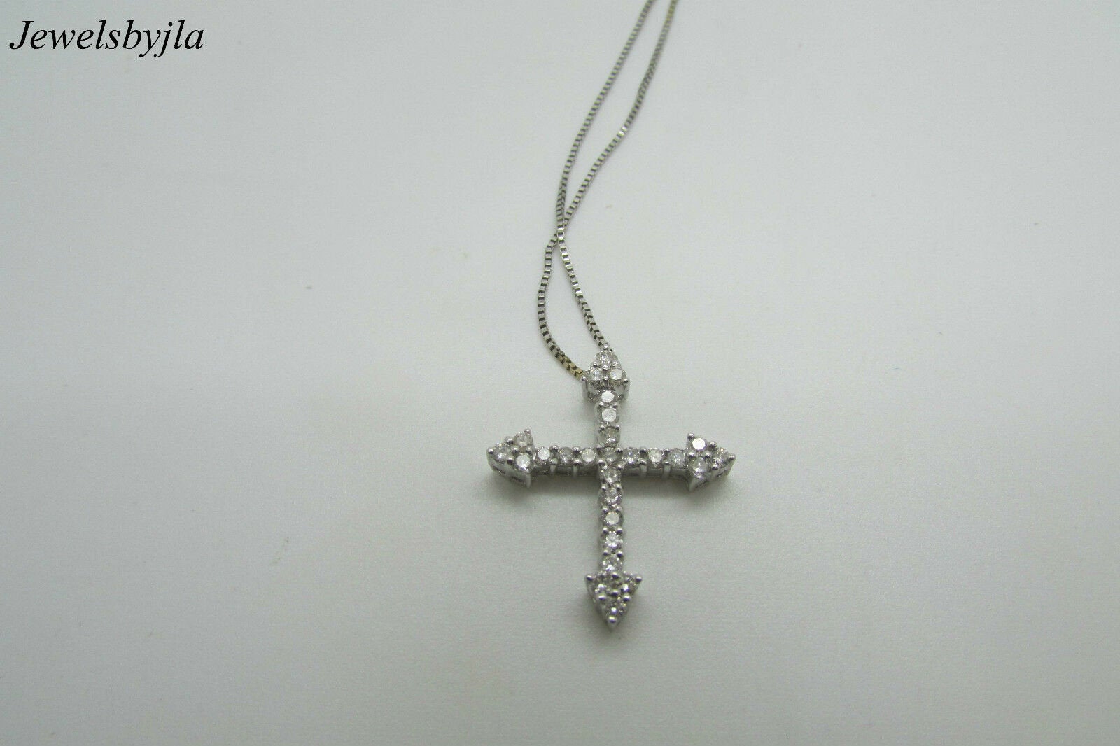 18K Pretty White Gold Diamond Cross Pendant With Arrow Shape Sides 0.54 Cts