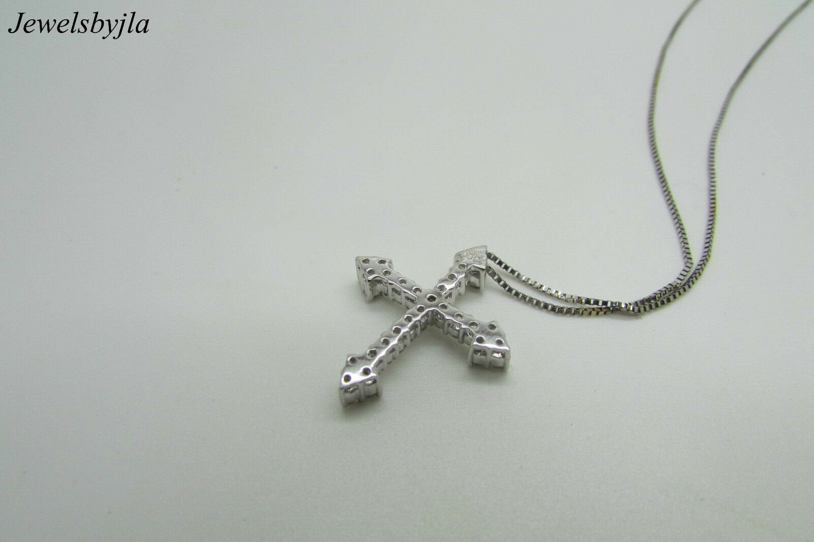 18K Pretty White Gold Diamond Cross Pendant With Arrow Shape Sides 0.54 Cts