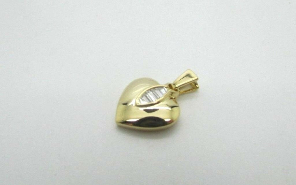 14K Pretty Yellow Gold Polished Heart Pendant With 6 Tapered Baguettes 2 Grams