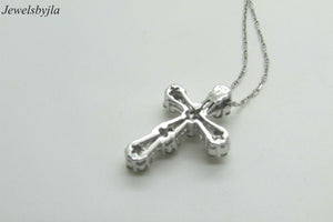 14K White Gold Clustered Cross Pendant With Round Diamonds and Baguettes 0.99 Cts