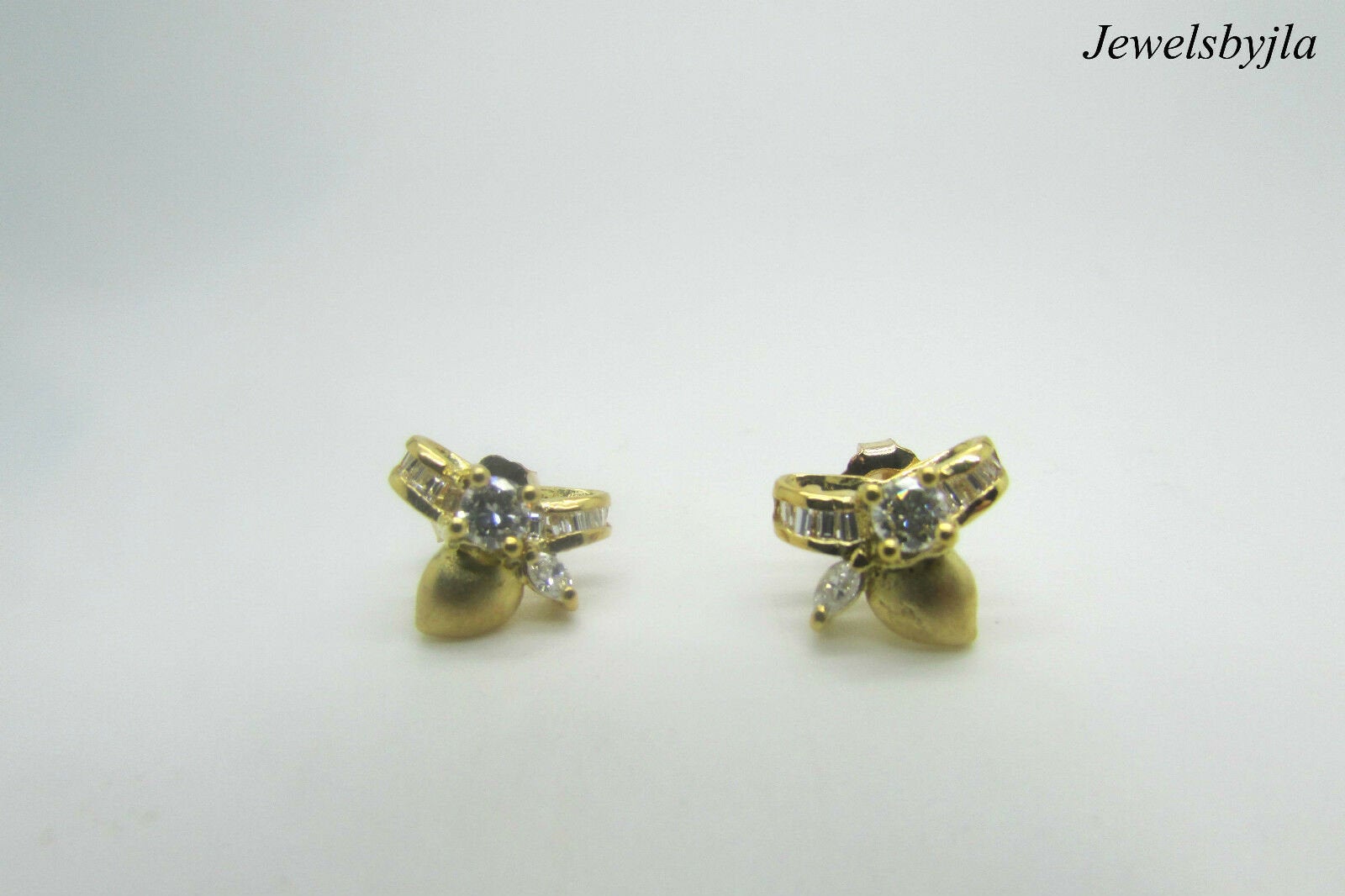 18K Yellow Gold Bow Earrings With Round, Marquis And Baguette Diamonds .77 Cts