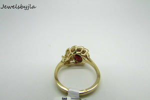 14K Yellow Gold Ladies Pretty Round Shaped Garnet Ring With Leaf Design