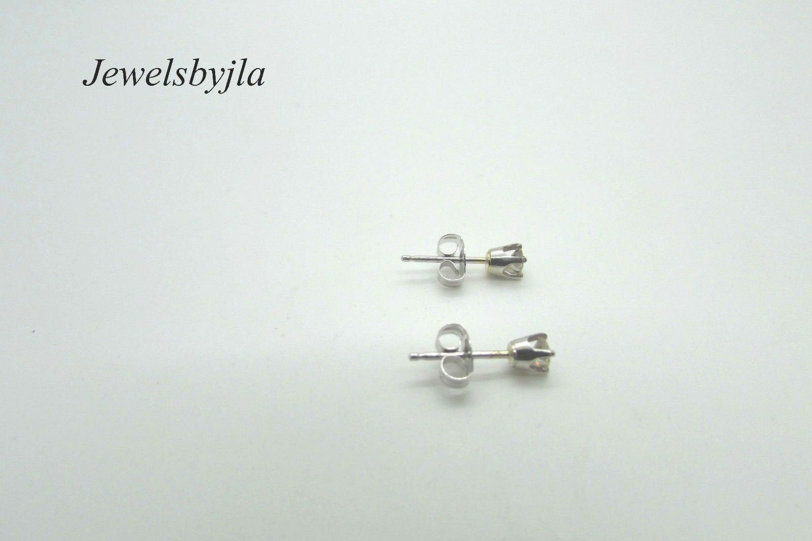 14K Pretty White Gold Round Diamond Stud Earrings .25 Points I Color I1 Clarity