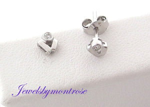 14K White Gold &quot;V&quot; Stud Earrings Holding 0.05 Cts Diamonds Weight 1.2 Grams.