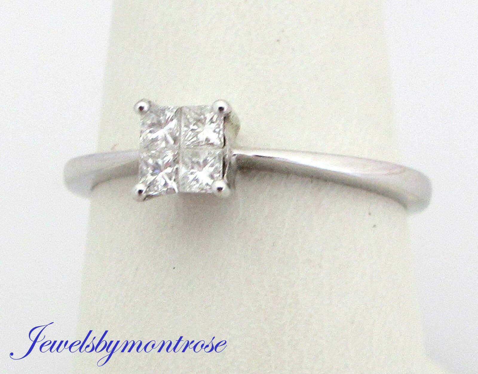 14K White Gold Engagement Ring With 4 Princess Cut Diamonds 0.25 Cts