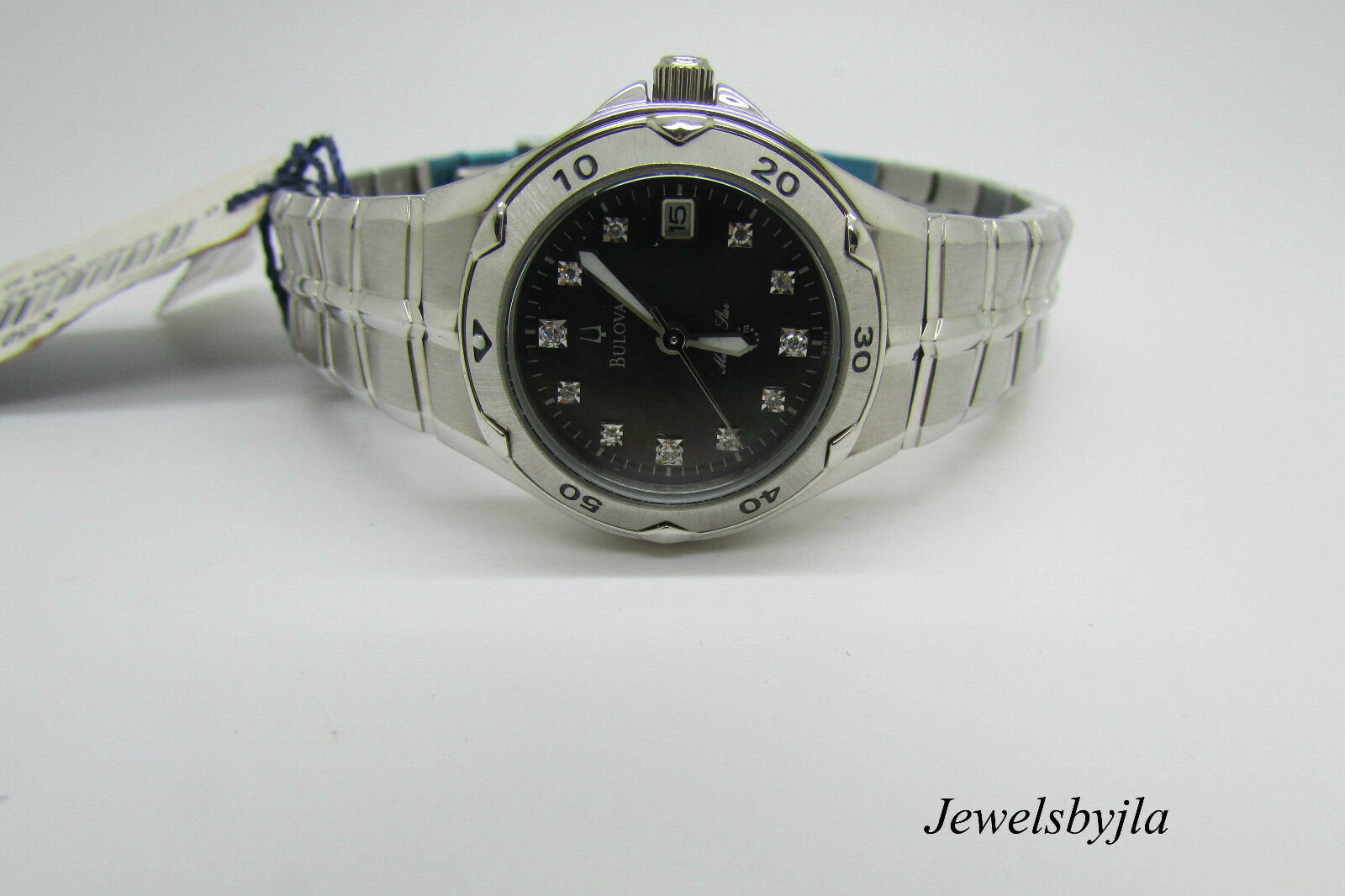 Bulova 96P12 Ladies Watch Black Mother Of Pearl Marine Star Diamonds