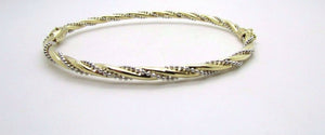 14K Pretty Two Tone Gold Bracelet With Twisted Diamond Cut Chain Wrapped Around