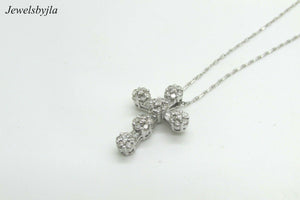 14K White Gold Clustered Cross Pendant With Round Diamonds and Baguettes 0.99 Cts
