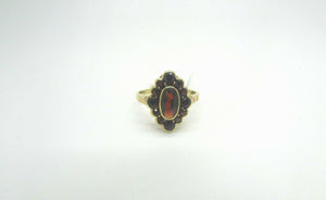 14K Ladies Pretty Yellow Gold Oval Ring With Oval and Round Shape Garnet Stones