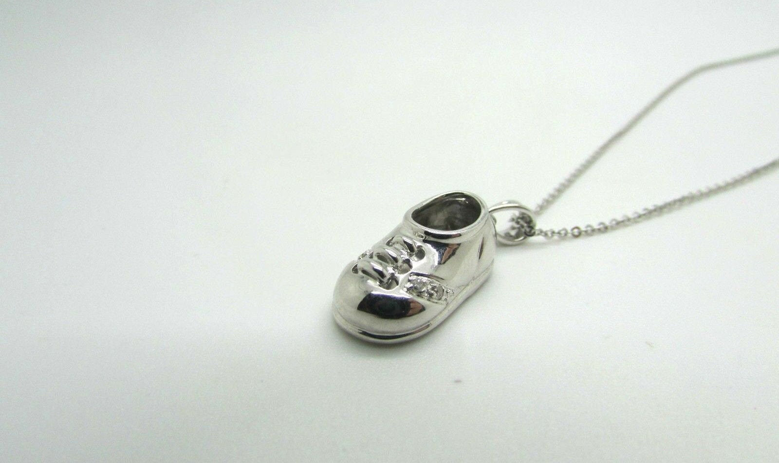 14K Pretty White Gold Shoe Pendant With Laces And Round Diamonds .02 Cts