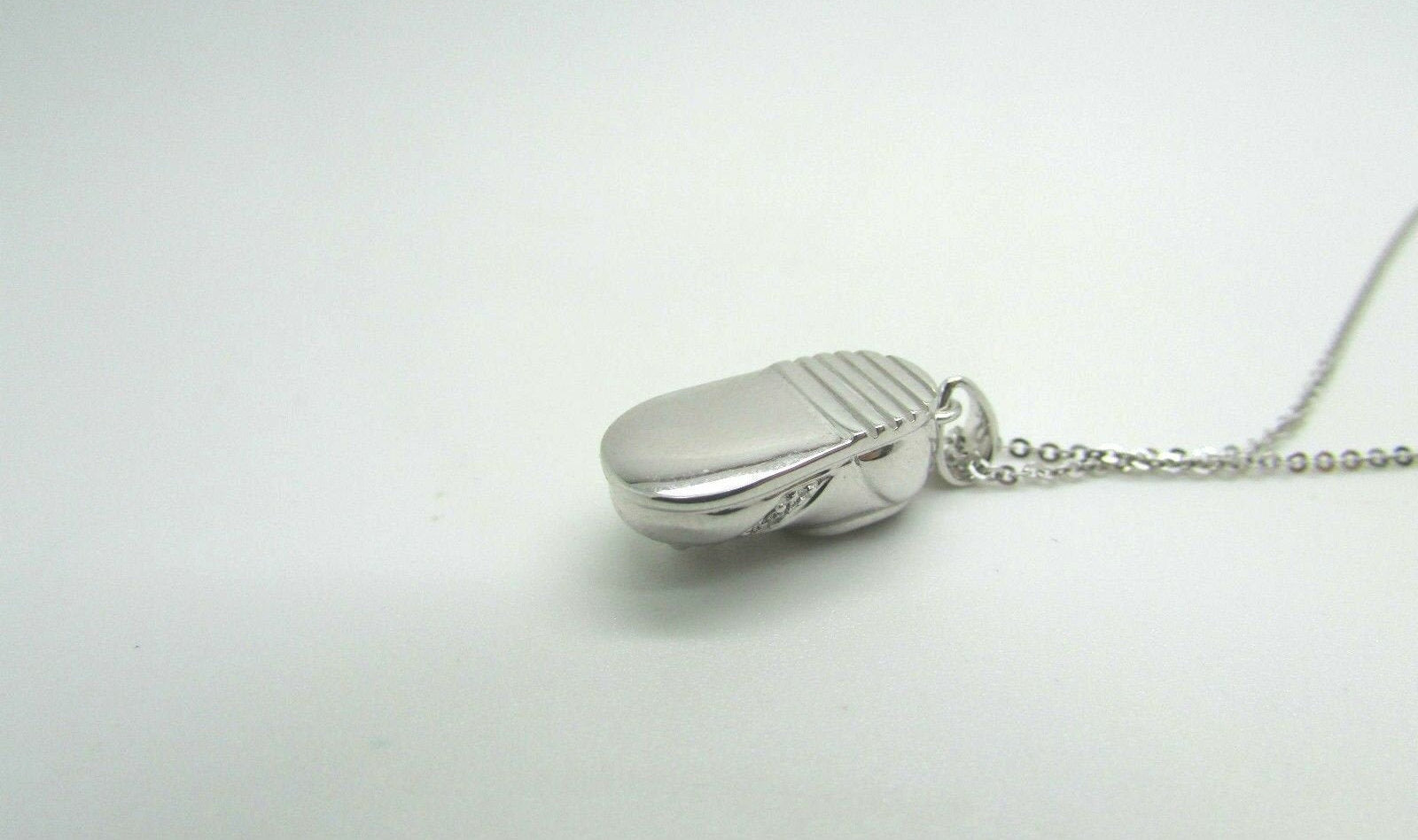 14K Pretty White Gold Shoe Pendant With Laces And Round Diamonds .02 Cts