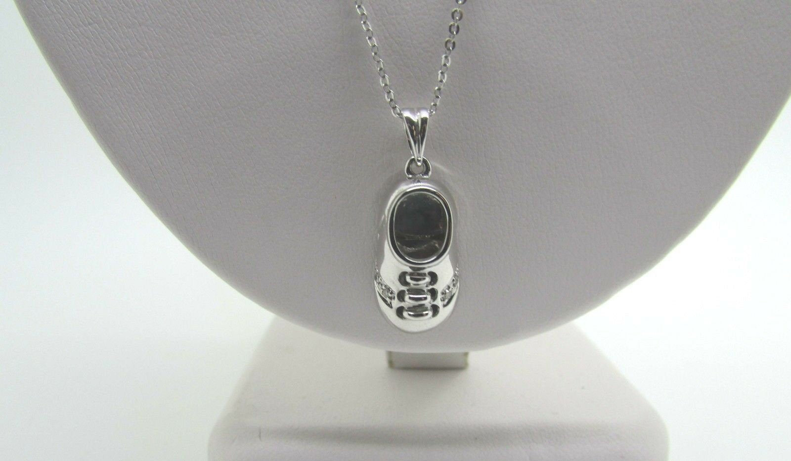14K Pretty White Gold Shoe Pendant With Laces And Round Diamonds .02 Cts